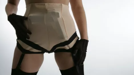 Facebook cuts sex and violence ads